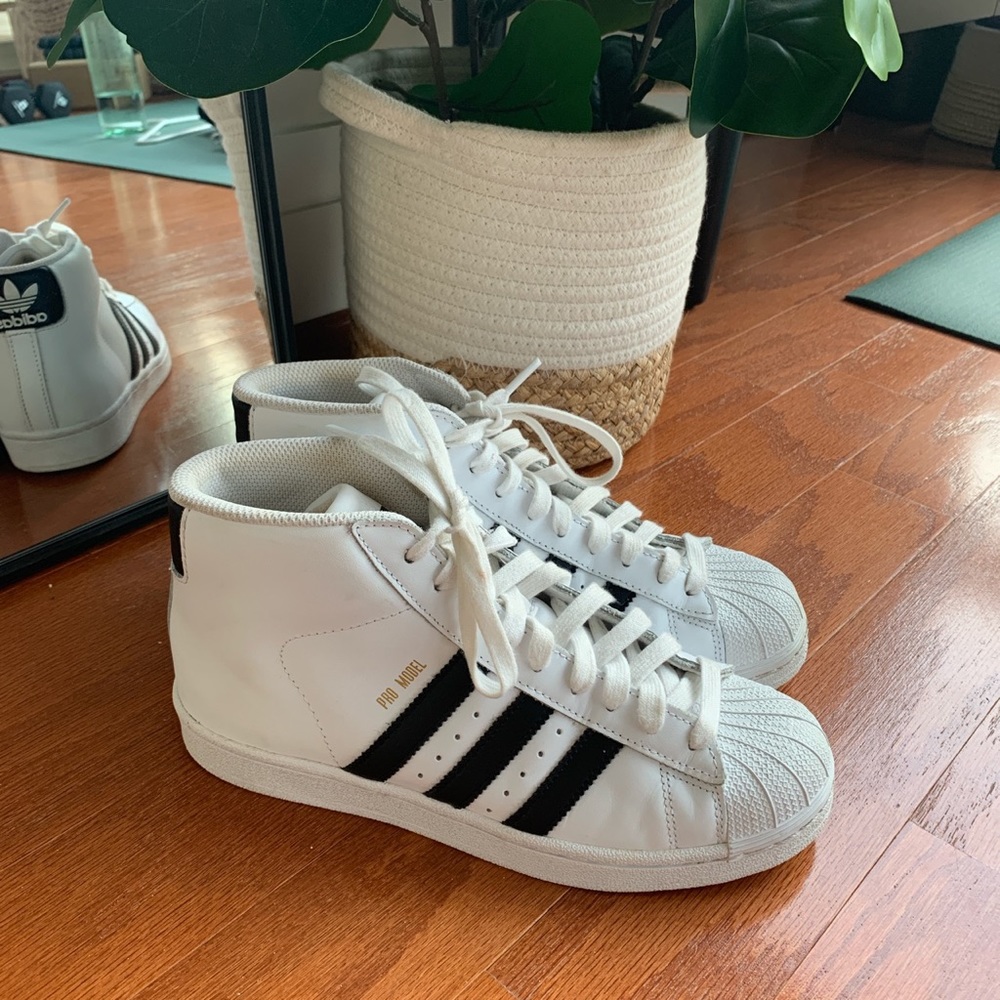 white adidas high top sneakers